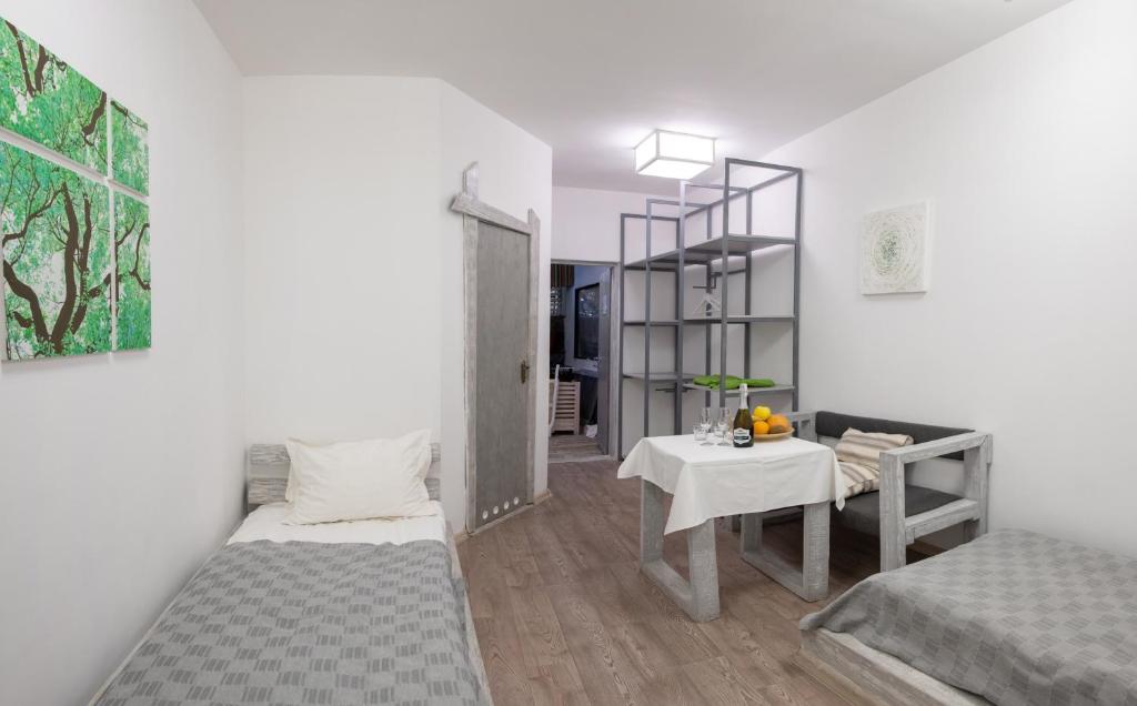 Postel nebo postele na pokoji v ubytování Higina Spa Hotel