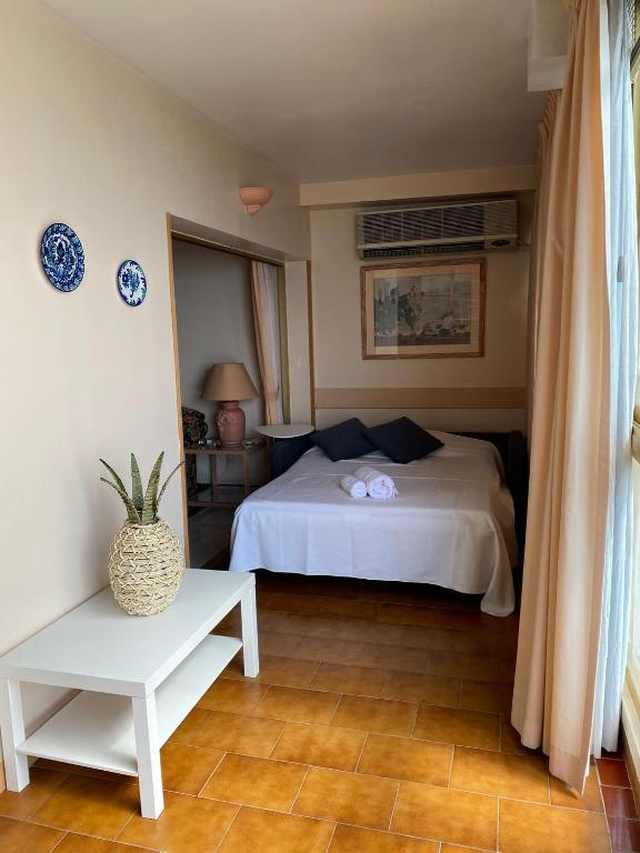 Postel nebo postele na pokoji v ubytování Precioso apartamento en primera línea de playa