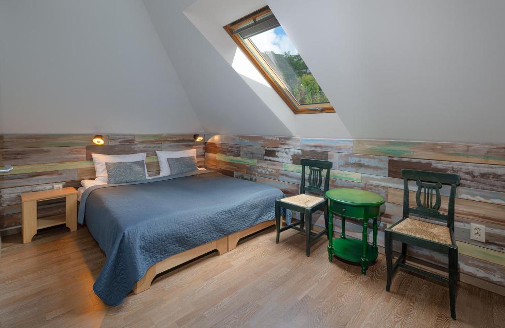 Postel nebo postele na pokoji v ubytování Butikhotel Visegrád