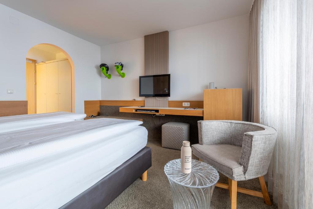 Posteľ alebo postele v izbe v ubytovaní Hotel Jakob