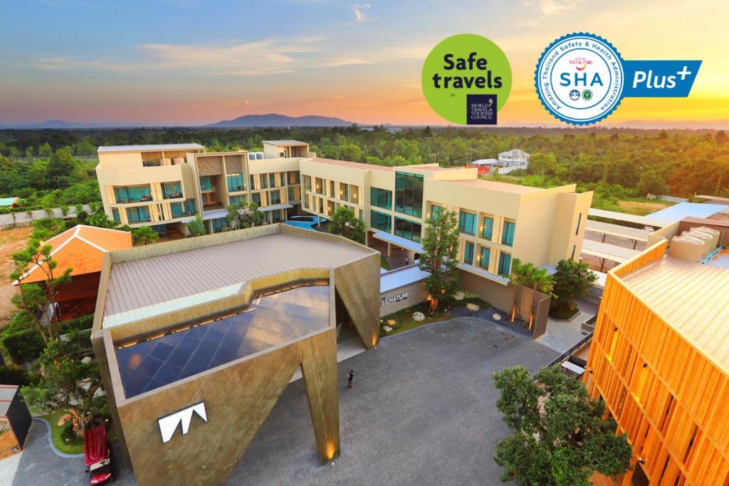 an image of a building with the sale travels logo at The Signature Hotel Airport in Hat Yai