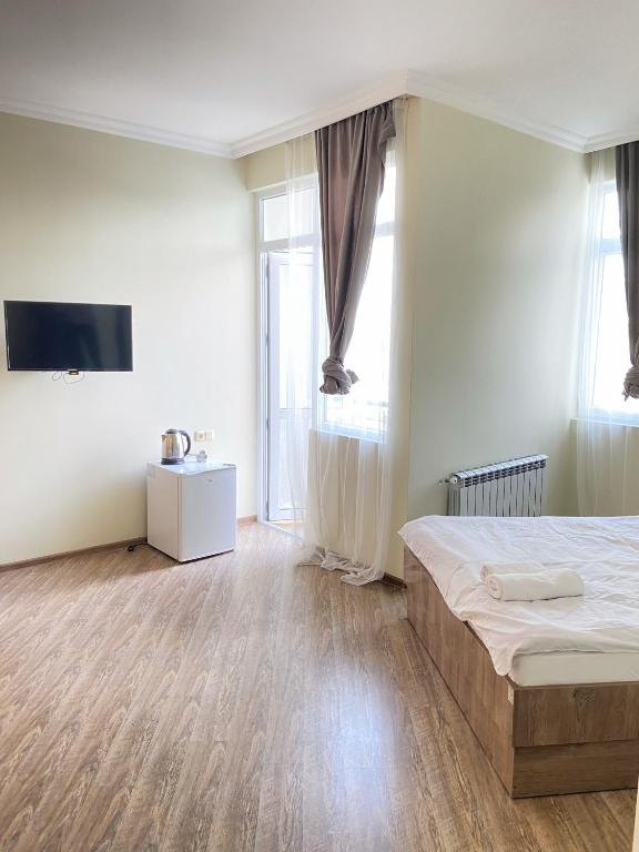Postel nebo postele na pokoji v ubytování Hotel Horizont!