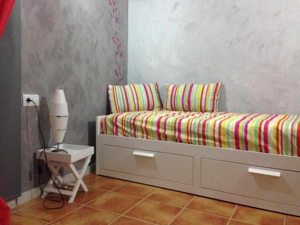 Postel nebo postele na pokoji v ubytování Casa Albana Alacón