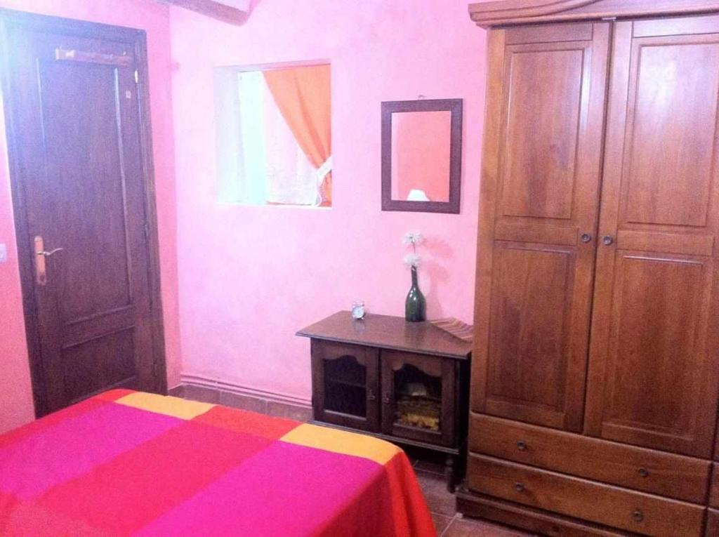 Postel nebo postele na pokoji v ubytování Casa Albana Alacón