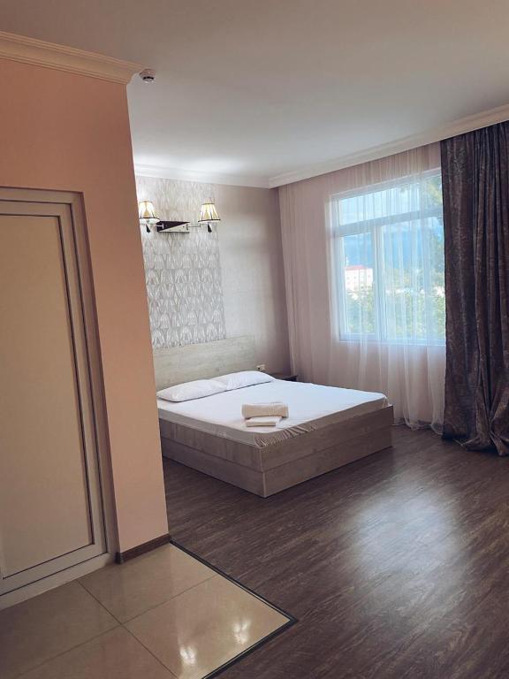Postel nebo postele na pokoji v ubytování Hotel Horizont!