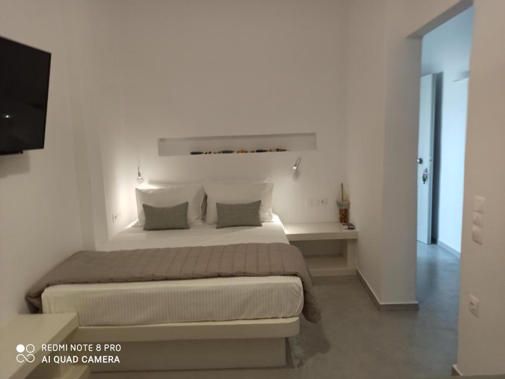 Postel nebo postele na pokoji v ubytování Kleri's apartments 6