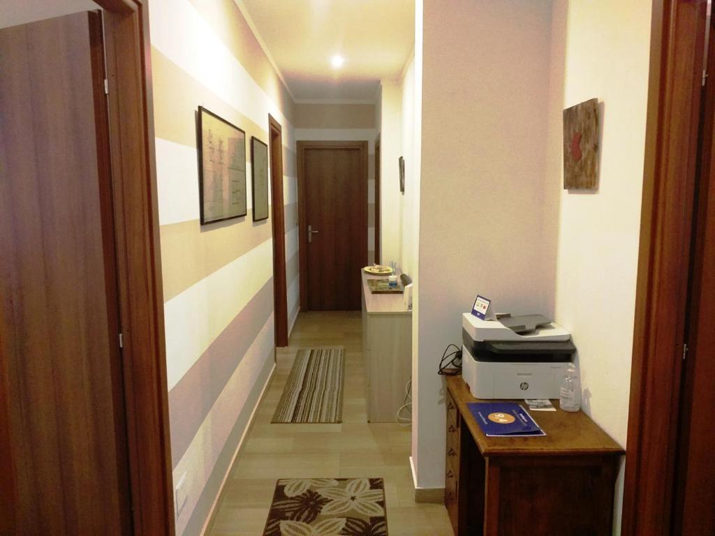 TV a/nebo společenská místnost v ubytování Edoardoapartments1
