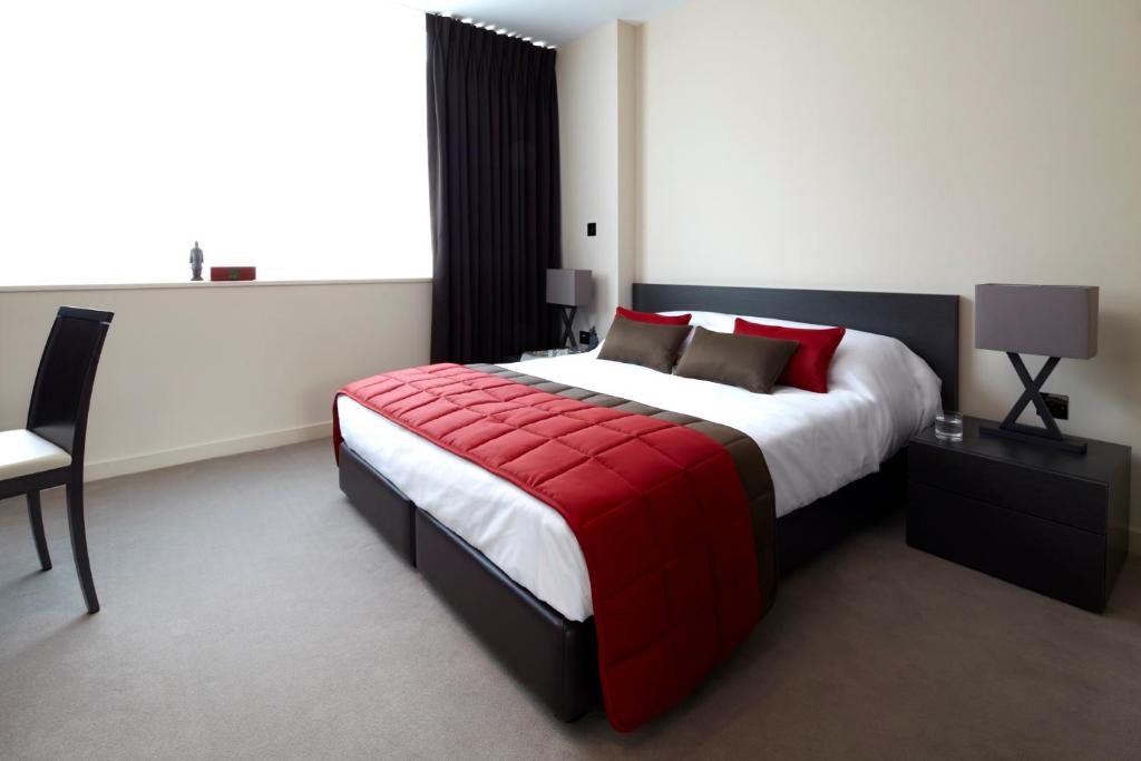 Postel nebo postele na pokoji v ubytování Hotel Xanadu
