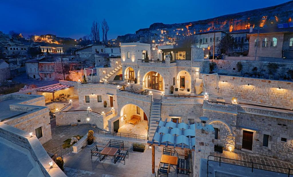 an aerial view of a building at night at Solem Cave Suites in Ürgüp