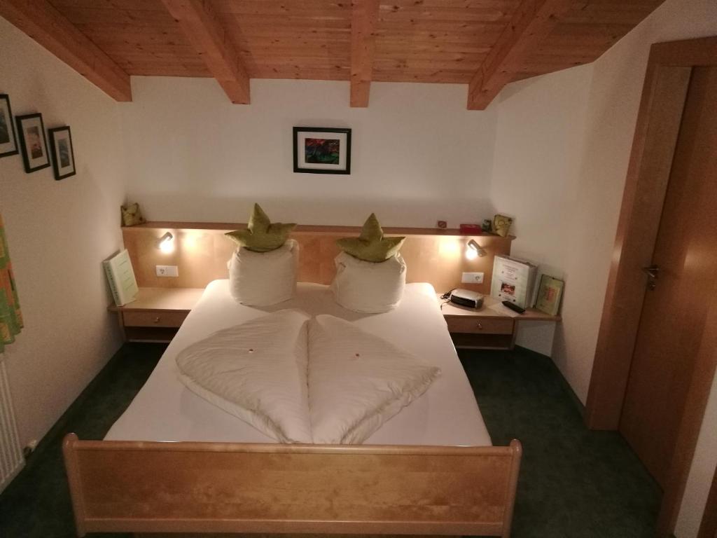 Postel nebo postele na pokoji v ubytování Haus Kristall