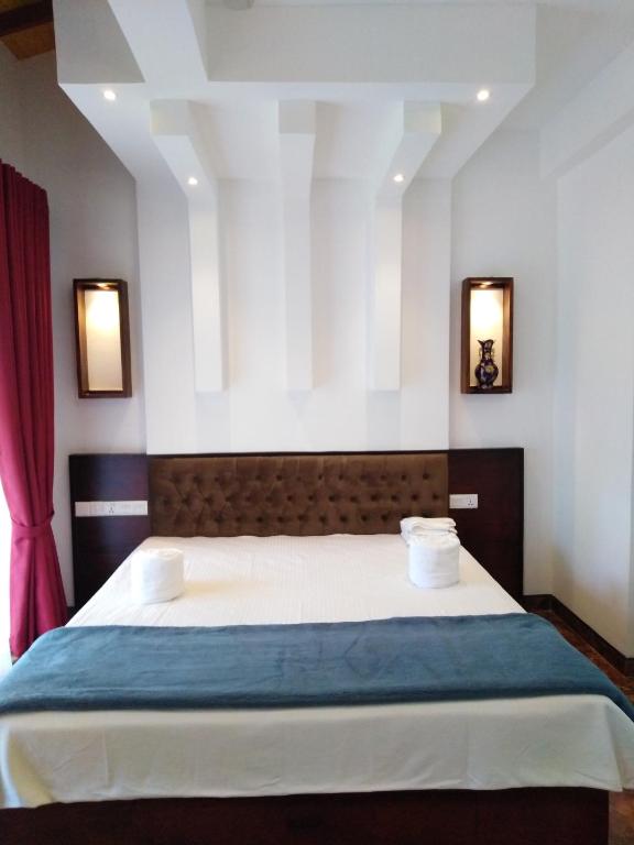 Postel nebo postele na pokoji v ubytování Y&Y Residence