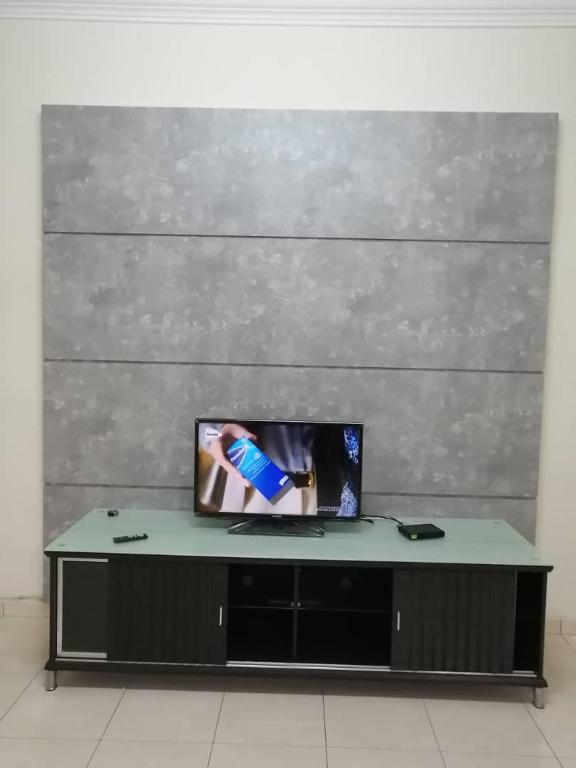 TV a/nebo společenská místnost v ubytování 爱民宿 Love House