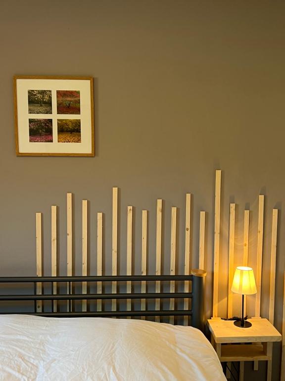 Postel nebo postele na pokoji v ubytování Gite Du Moulin Coquelicot
