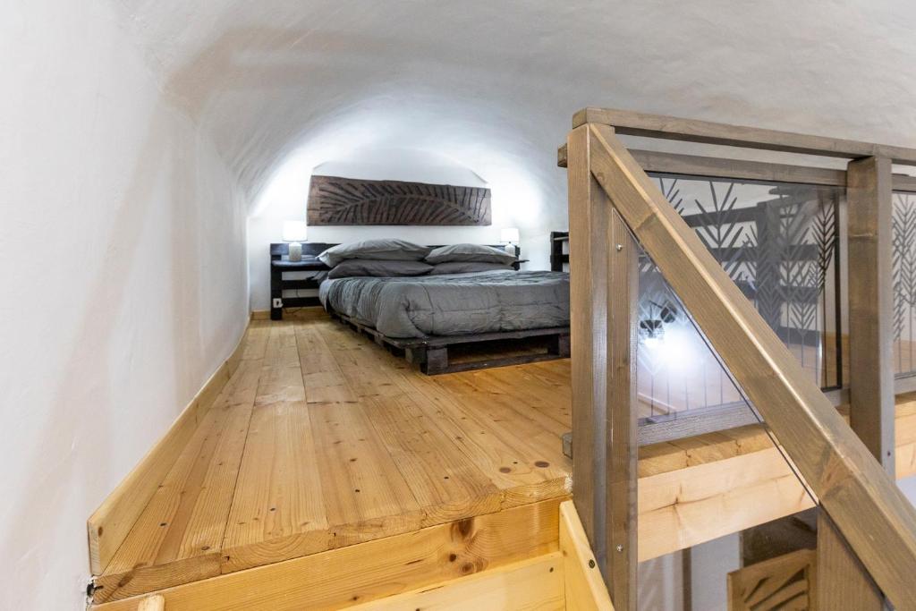 Postel nebo postele na pokoji v ubytování Casa Ginevra