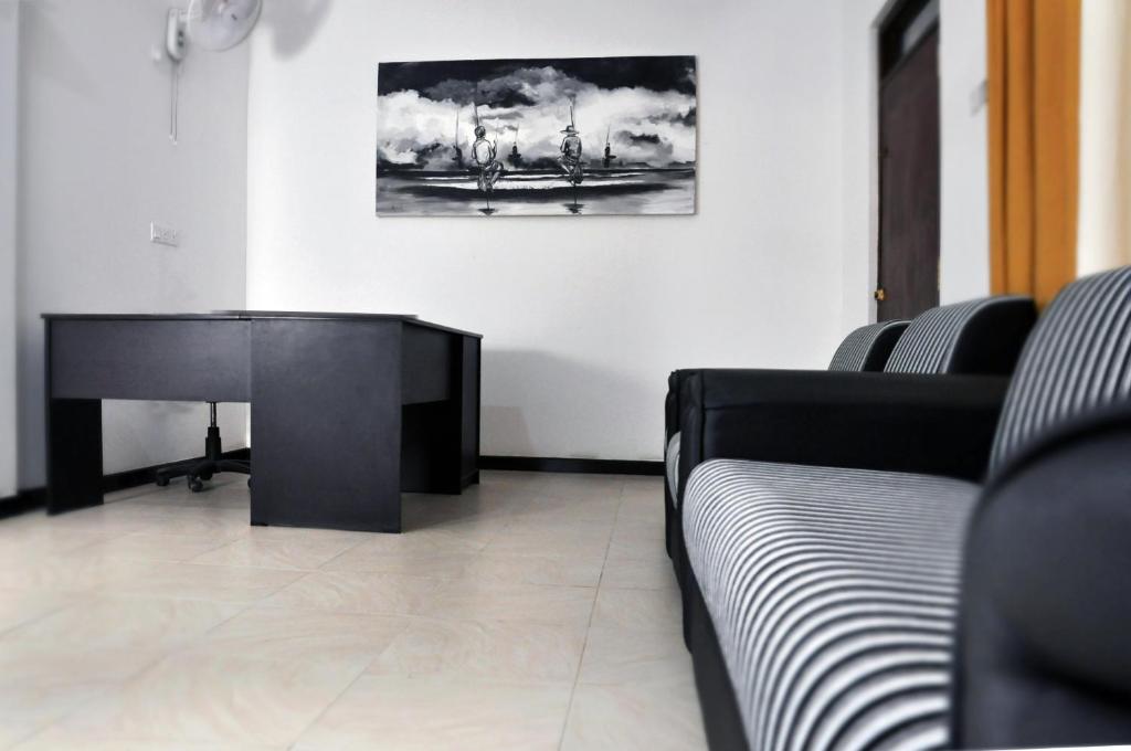 Posezení v ubytování Triple Edge Villa