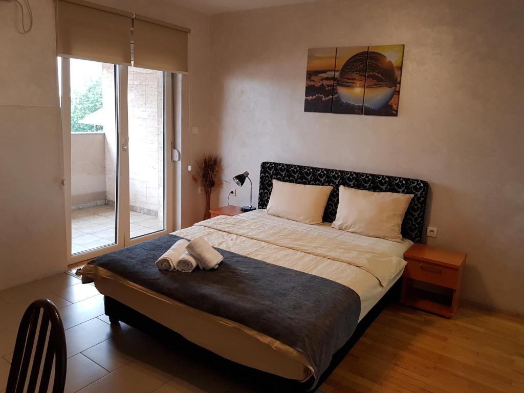 Postel nebo postele na pokoji v ubytování Kengur Resort