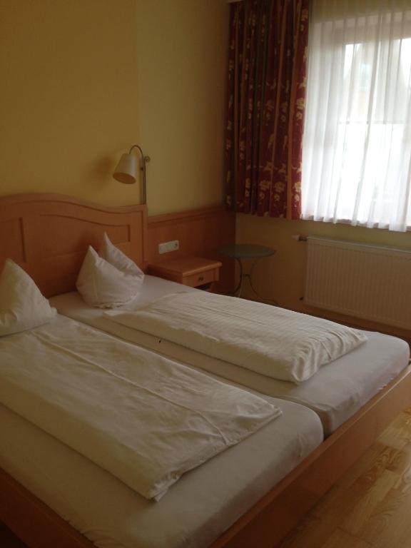 Postel nebo postele na pokoji v ubytování Peterwirt
