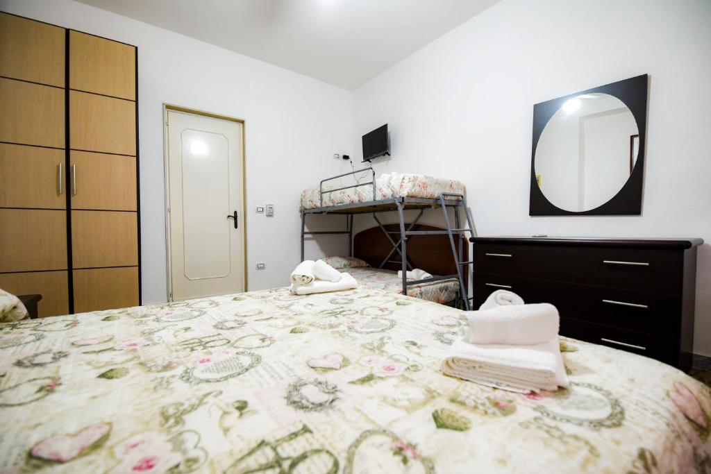 Кровать или кровати в номере Sea Salento Casa Vacanze