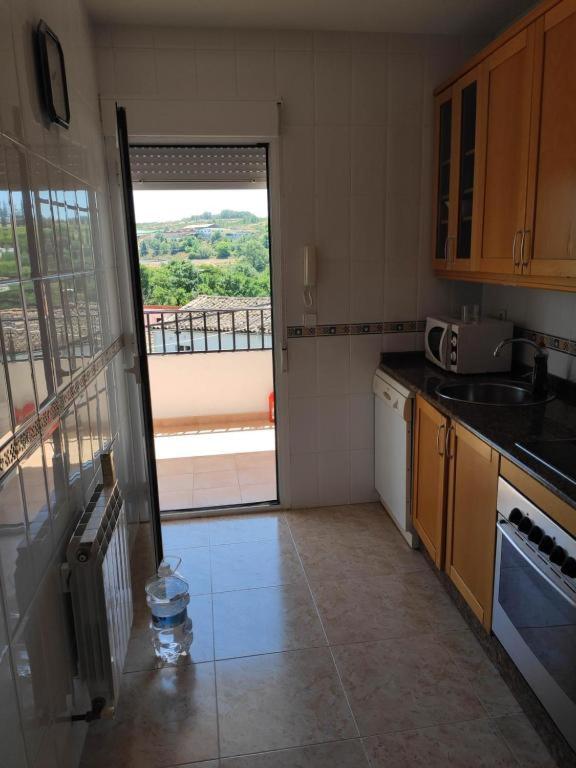 Kuchyň nebo kuchyňský kout v ubytování Apartamento La Relojera 1