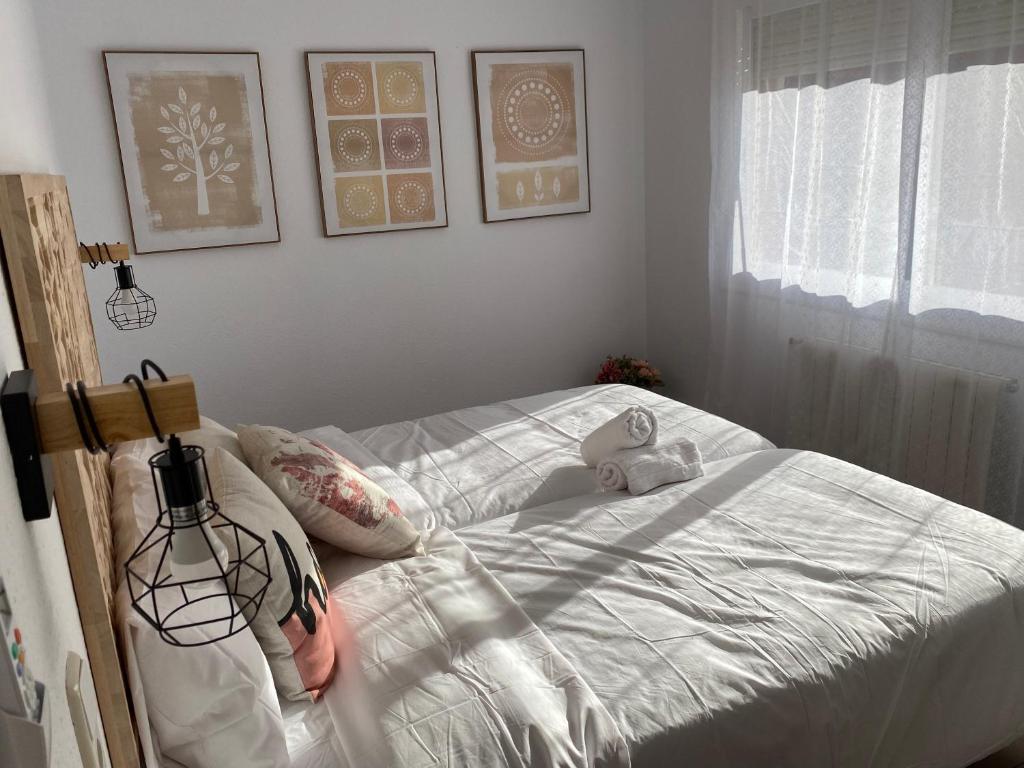 A bed or beds in a room at Vilamarlux VI