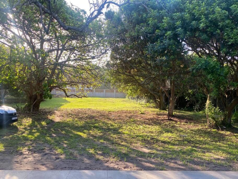 a park with trees and a field of grass at 7th Heaven in Tugela Mouth