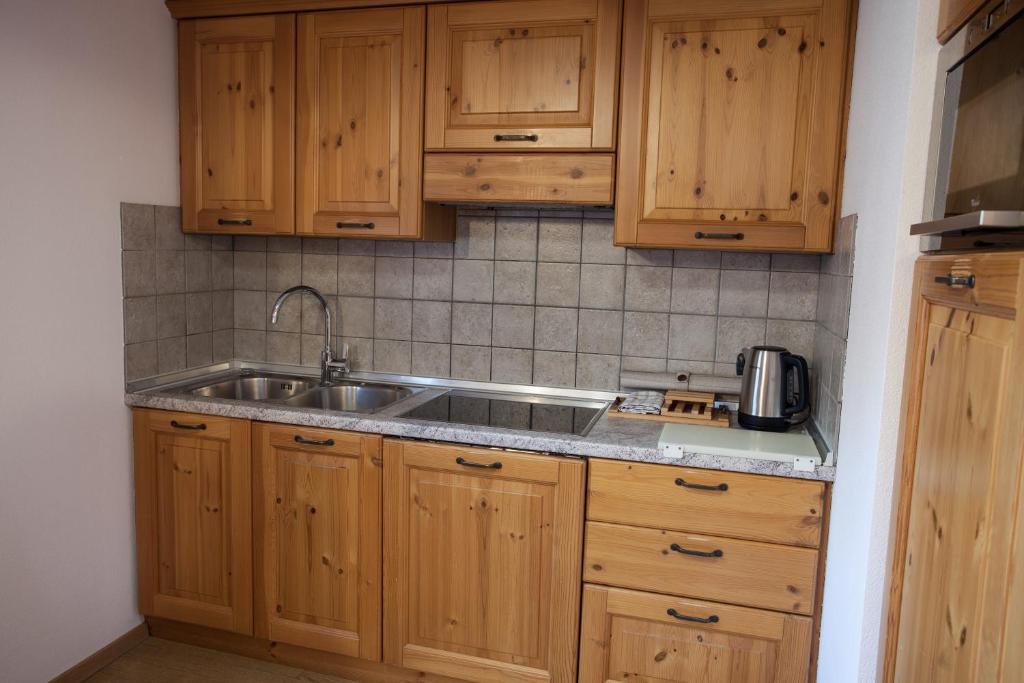 Kuchyňa alebo kuchynka v ubytovaní lareit appartamenti