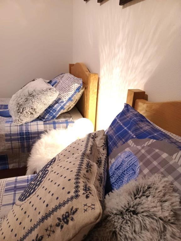 Postel nebo postele na pokoji v ubytování Appartamento Valmaor