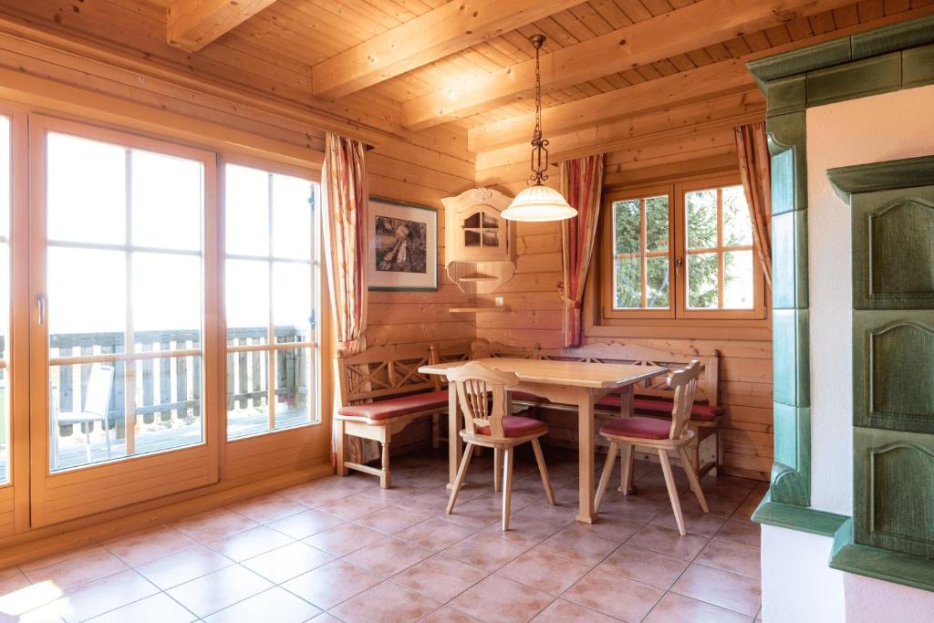 A balcony or terrace at Feriendorf Koralpe Alpenrose
