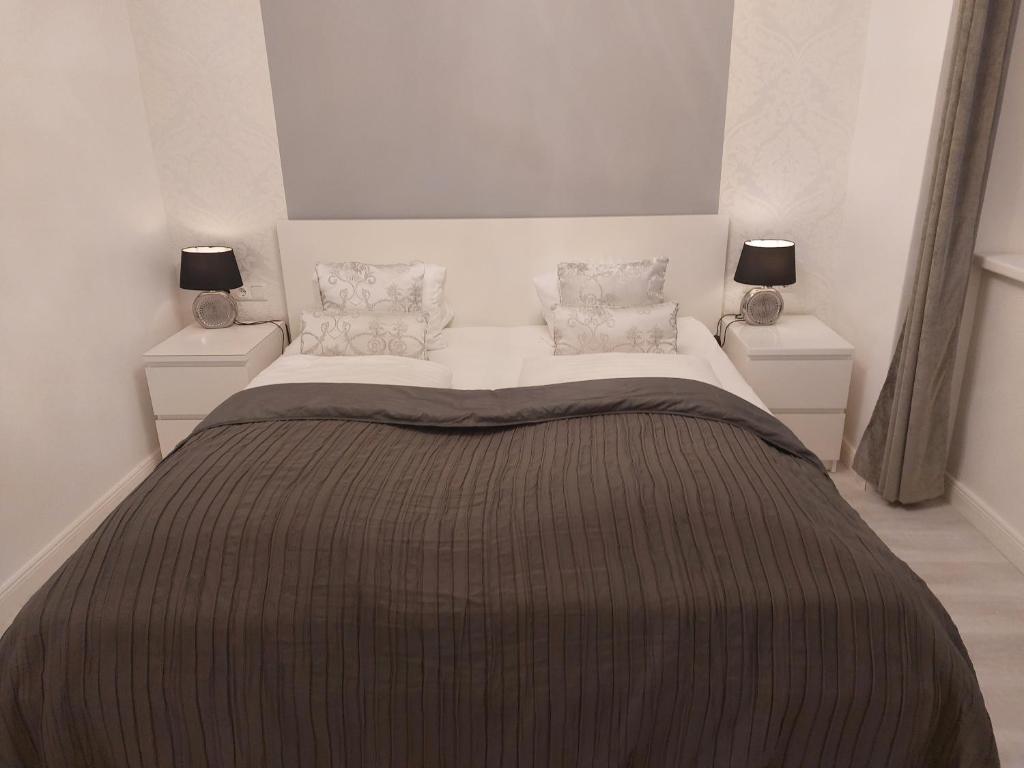 Postel nebo postele na pokoji v ubytování Grenzberg Appartements