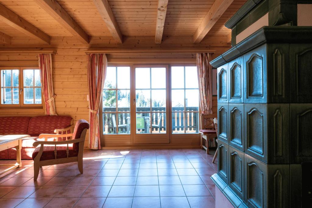 A seating area at Feriendorf Koralpe Alpenrose