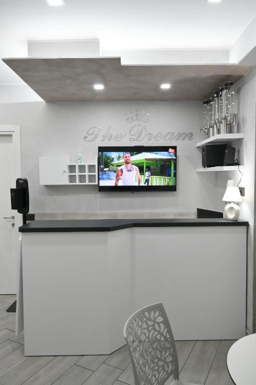 A kitchen or kitchenette at B&B The Dream