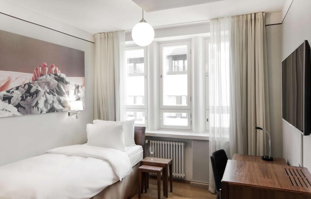 TV a/nebo společenská místnost v ubytování Radisson Blu Aleksanteri Hotel, Helsinki