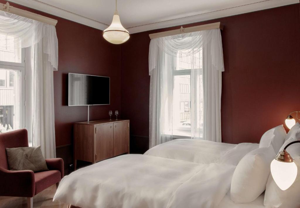Postel nebo postele na pokoji v ubytování Radisson Blu Aleksanteri Hotel, Helsinki
