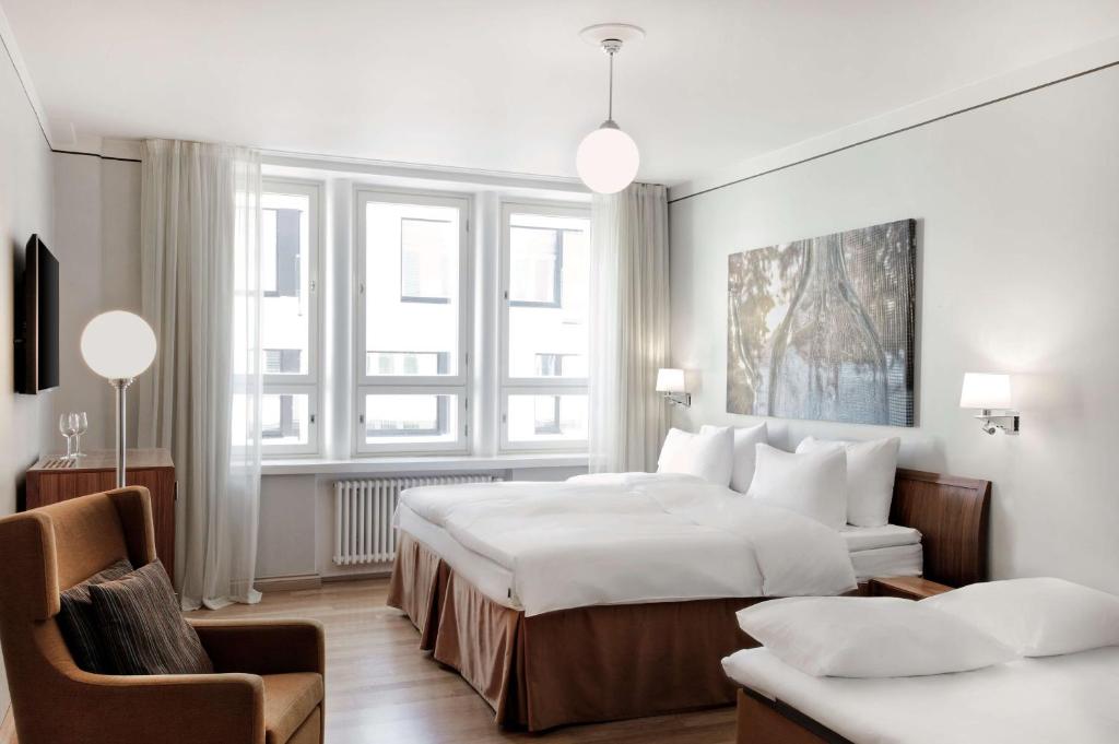 Postel nebo postele na pokoji v ubytování Radisson Blu Aleksanteri Hotel, Helsinki