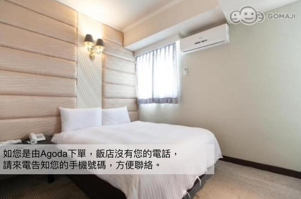 Llit o llits en una habitació de Hotel Fouquet