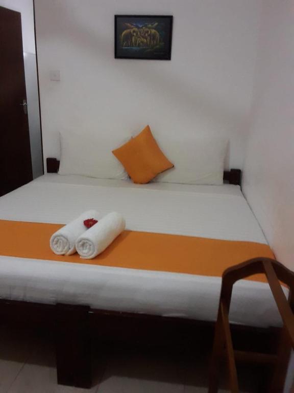 Postel nebo postele na pokoji v ubytování Villa DeLorenta