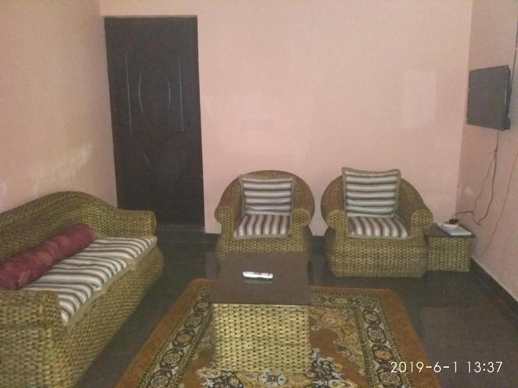 Posezení v ubytování Coorg West End Home Stay