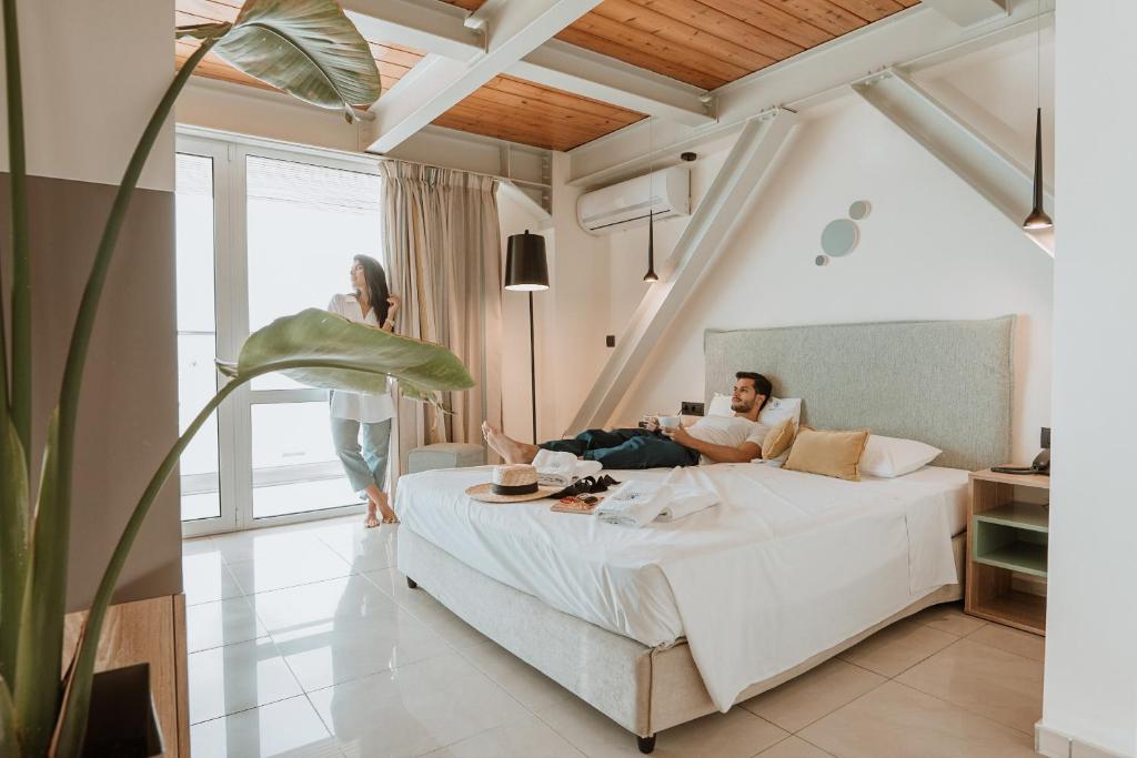 Posteľ alebo postele v izbe v ubytovaní Infinity City Boutique Hotel