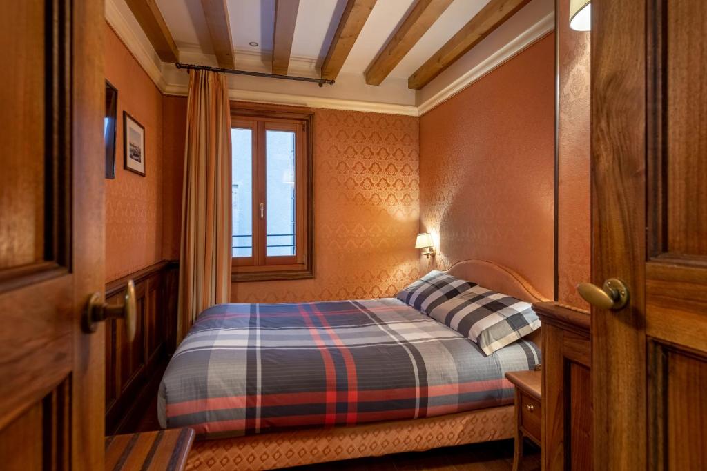 Postel nebo postele na pokoji v ubytování Hotel Montecarlo