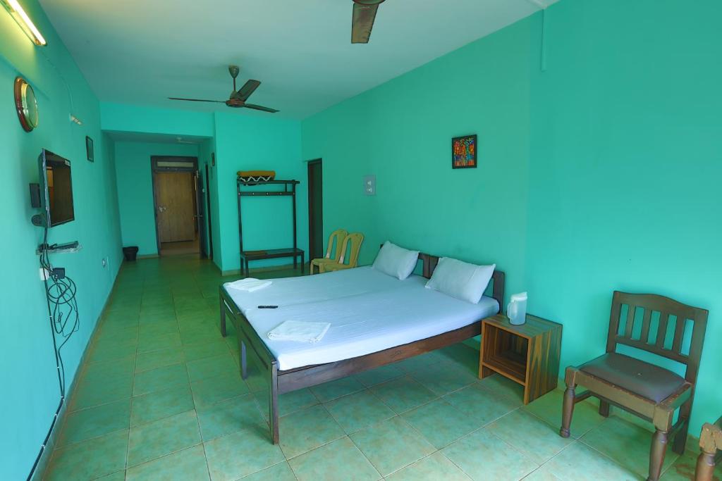 Uma cama ou camas num quarto em Hotel Orfil