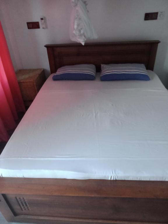 Postel nebo postele na pokoji v ubytování Sun Rest Mirissa