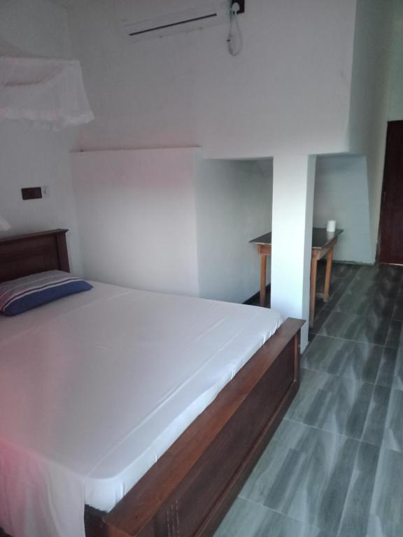 Postel nebo postele na pokoji v ubytování Sun Rest Mirissa
