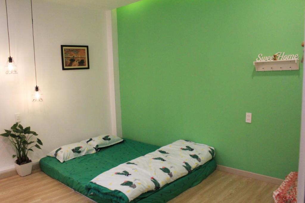 Postel nebo postele na pokoji v ubytování Selena Dalat Homestay