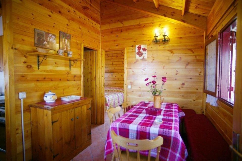 A bed or beds in a room at CHALET ETNA MILO