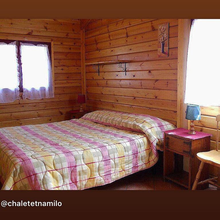 A bed or beds in a room at CHALET ETNA MILO