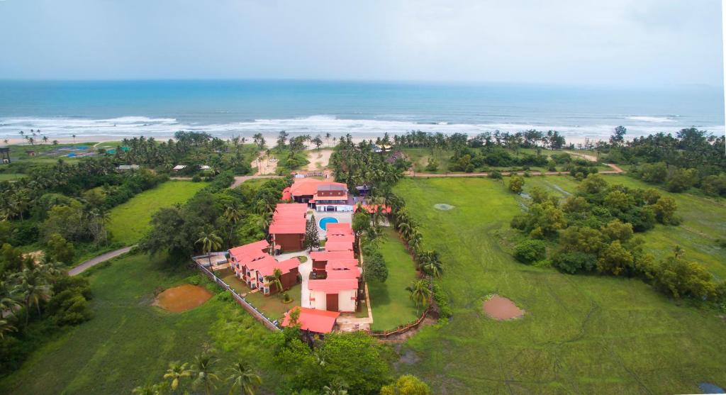 an aerial view of a house on the beach at Sea Queen Beach Resort & Spa in Colva