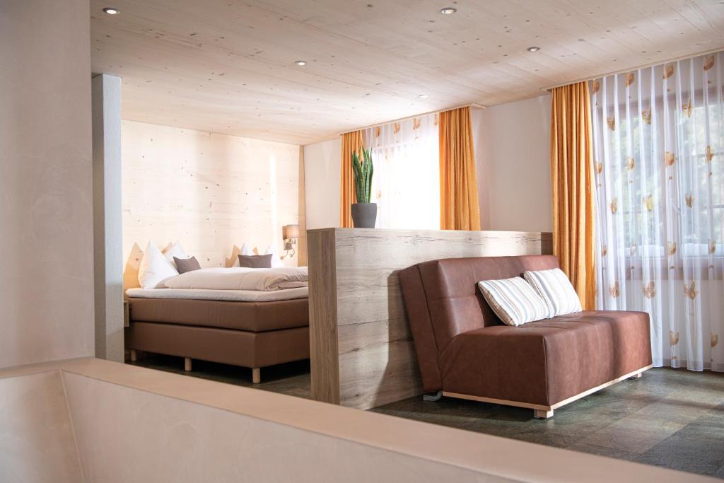Postel nebo postele na pokoji v ubytování Hotel Silberhorn