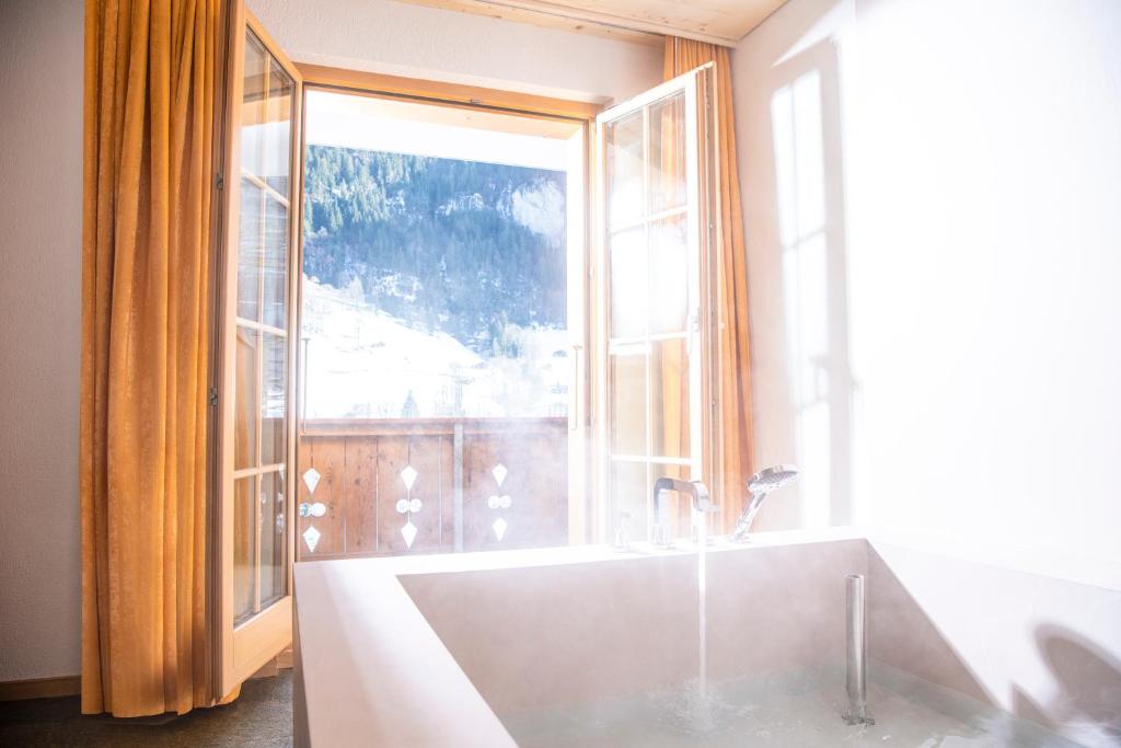 Koupelna v ubytování Hotel Silberhorn