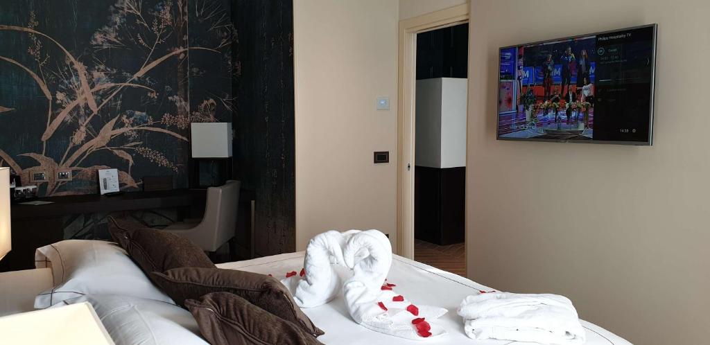 Łóżko lub łóżka w pokoju w obiekcie Best Western Plus Hotel Perla Del Porto