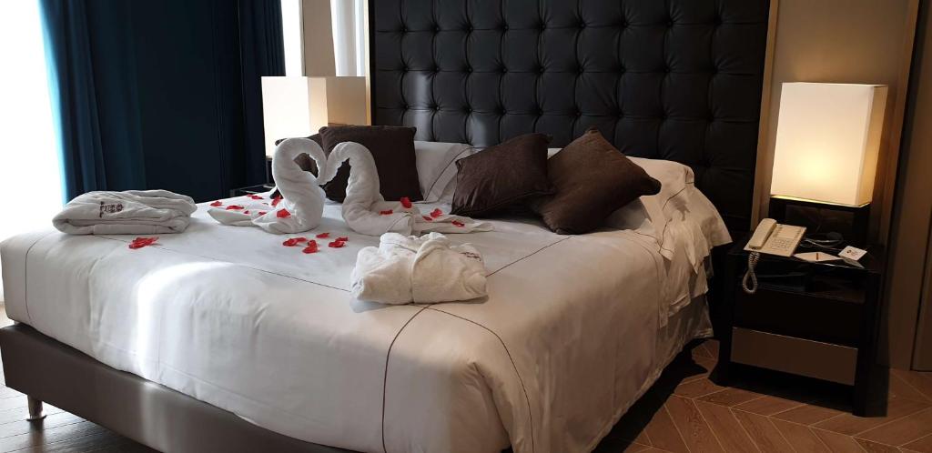 Łóżko lub łóżka w pokoju w obiekcie Best Western Plus Hotel Perla Del Porto